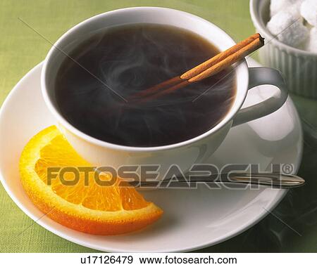 Stock Photo - Coffee with Cinnamon and Orange, High Angle View, Full Frame. Fotosearch