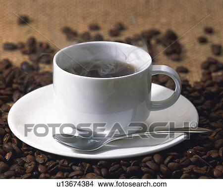 Hot Coffee and Coffee Beans, Full Frame, Differential Focus View Large Photo Image Picture - Hot Coffee and Coffee Beans, Full Frame, Differential Focus. Fotosearch