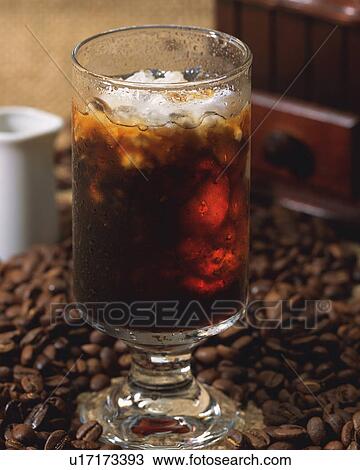 Stock Image - Ice Coffee and Coffee Beans, Full Frame, Differential Focus. Fotosearch