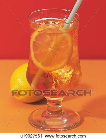 Stock Image - Ice Lemon Tea and Lemon, Full Frame, Differential Focus. Fotosearch