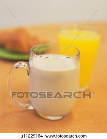 Picture - Milk and Orange Juice and Croissant, Differential Focus, Full Frame, Side View. Fotosearch