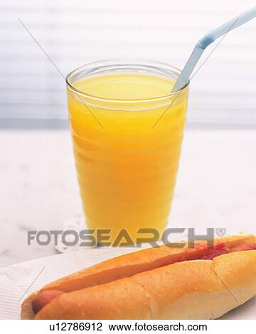 Orange Juice and Hot Dog, Full Frame, Differential Focus View Large Photo Image Stock Image - Orange Juice and Hot Dog, Full Frame, Differential Focus. Fotosearch
