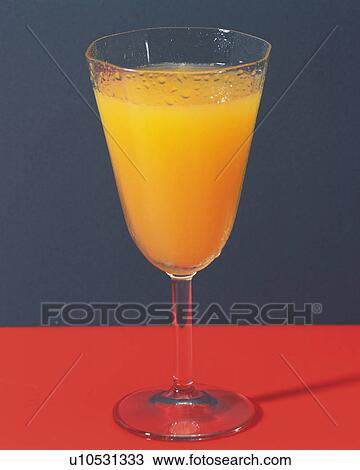 Stock Image - Orange Juice on the Table, Full Frame. Fotosearch