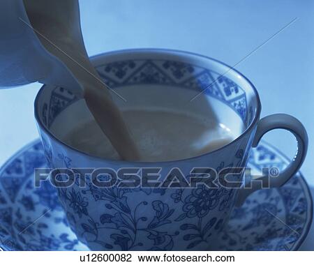Royal Milk Tea That is Poured in the Tea Cup, Full Frame, Toned Image View Large Photo Image Stock Image - Royal Milk Tea That is Poured in the Tea Cup, Full Frame, Toned Image. Fotosearch