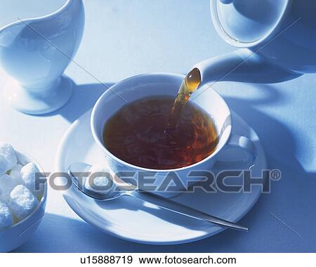Stock Photo - Tea That is Poured and Sugar, High Angle View, Full Frame. Fotosearch