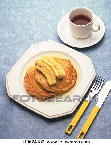 Pancake topped with Banana, High Angle View View Large Photo Image Stock Image - Pancake topped with Banana, High Angle View. Fotosearch