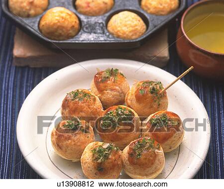 Stock Image - Takoyaki, High Angle View, Differential Focus. Fotosearch