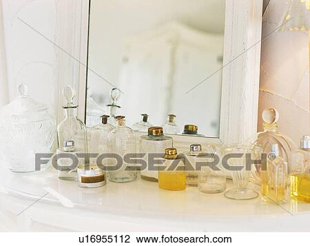 a Large Group of Bottles Standing In Front of a Mirror, Front View View Large Photo Image Stock Image - a Large Group of Bottles Standing In Front of a Mirror, Front View. Fotosearch