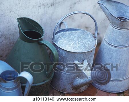 Four Different Watering Can, High Angle View View Large Photo Image Stock Image - Four Different Watering Can, High Angle View. Fotosearch