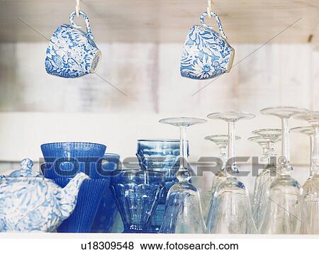 Stock Photo -  Several Blue-toned Glasses and Cups, Front View. Fotosearch
