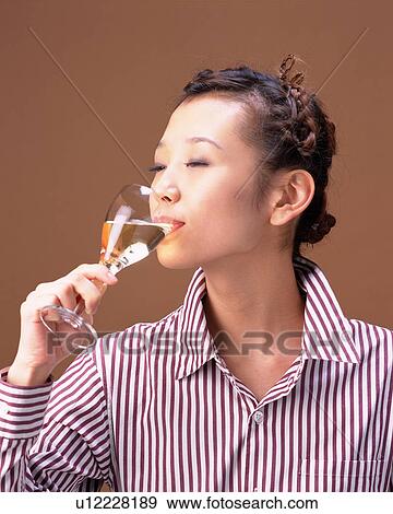 A Woman Drinking Wine, Front View View Large Photo Image Stock Photo - A Woman Drinking Wine, Front View . Fotosearch