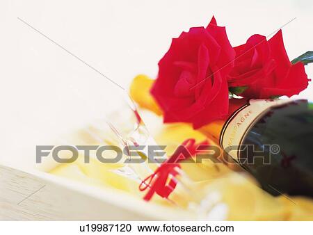 Stock Image - Champagne and Red Roses. Fotosearch
