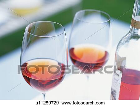Two Wineglasses, Rose Wine View Large Photo Image Stock Photo - Two Wineglasses, Rose Wine. Fotosearch