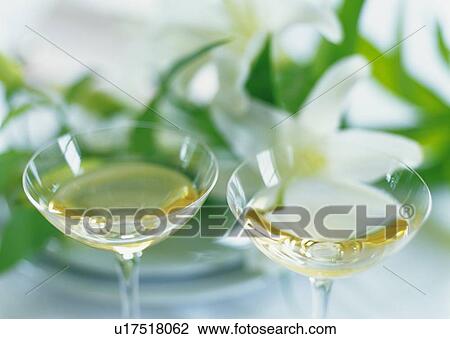 Stock Image - Two Wineglasses, White Wine. Fotosearch