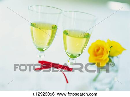 Stock Photograph - Two Wineglasses, White Wine. Fotosearch