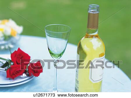 Stock Image - White Wine and Wineglass. Fotosearch