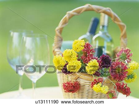 Stock Image - White Wine in Flower Basket. Fotosearch