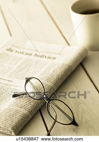 Stock Photo - Newspaper and Glasses. Fotosearch