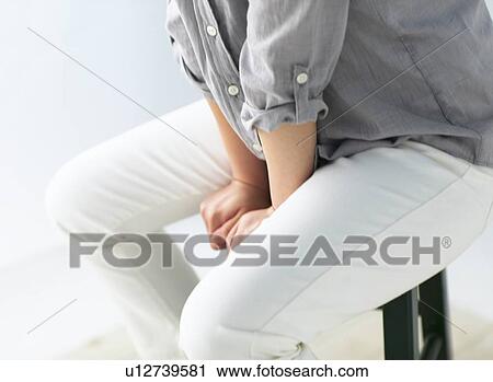 Woman who sit on a chair View Large Photo Image Stock Image - Woman who sit on a chair. Fotosearch