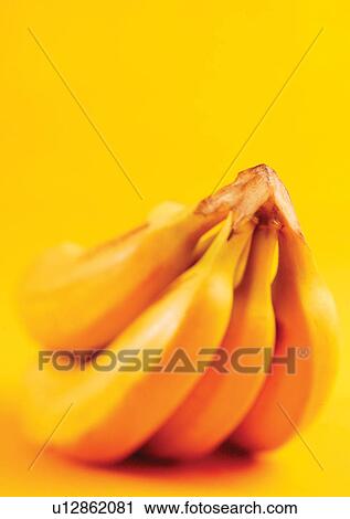 Stock Image - banana, blurred, close-up, fresh fruit. Fotosearch