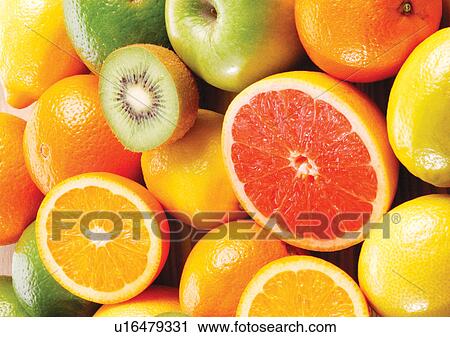 Stock Image - citrus fruit, close-up, cut, fresh fruit. Fotosearch