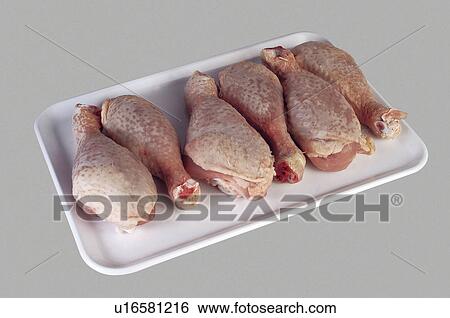 Stock Photograph - Supermarket, Food, Tray, Chicken, Raw, Raw chicken, Thigh. Fotosearch