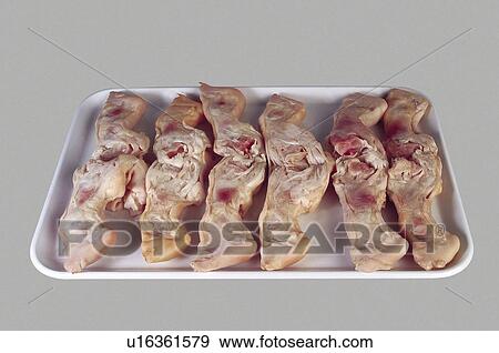 Stock Photo - Supermarket, Food, Tray, Tripe and offal shop, Lamb, Lamb hands, Raw. Fotosearch