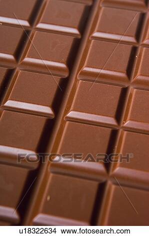 Chocolate, Chocolate bar, Black chocolate, Chocolate square, Chocolate squares, Close up, Background View Large Photo Image Picture - Chocolate, Chocolate bar, Black chocolate, Chocolate square, Chocolate squares, Close up, Background. Fotosearch