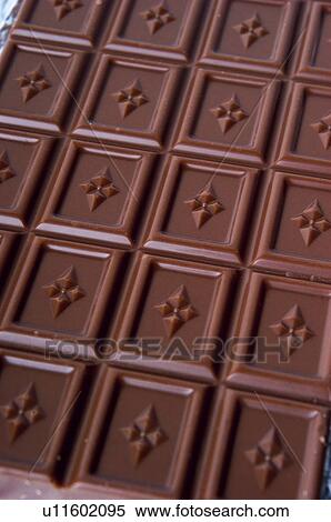 Chocolate, Chocolate bar, Black chocolate, Chocolate square, Chocolate squares, Close up, Background View Large Photo Image Stock Photography - Chocolate, Chocolate bar, Black chocolate, Chocolate square, Chocolate squares, Close up, Background. Fotosearch