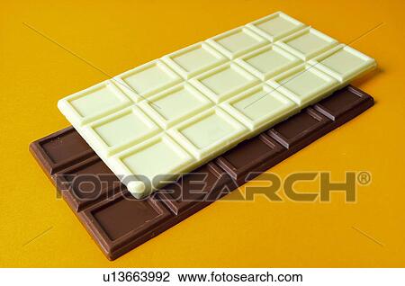 Stock Image - Chocolate, Chocolate bar, Two, Black chocolate, White chocolate, Chocolate square, Chocolate squares. Fotosearch