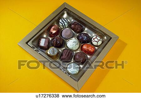 Stock Photo - Chocolate, Chocolates, Sweet, Chocolates box, Dessert, Present. Fotosearch