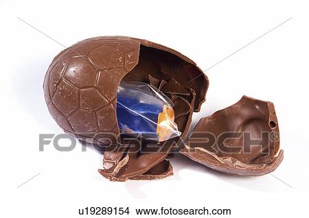 Picture - Chocolate, Egg, Chocolate egg, Black chocolate, Broken, Gift, Inside. Fotosearch