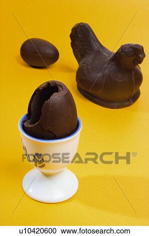 Stock Image - Chocolate, Egg, Eggs, Chocolate egg, Chocolate eggs, Black chocolate, Broken. Fotosearch