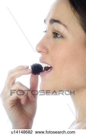 Stock Image - Woman, Beauty, Face, Young, Health, Healthy, Healthy food. Fotosearch