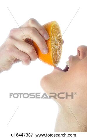 Stock Photo - Woman, Beauty, Face, Young, Health, Healthy, Healthy food. Fotosearch