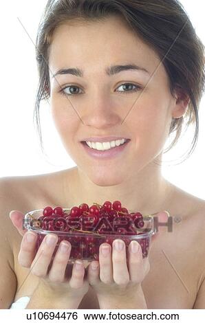 Stock Photograph - Woman, Beauty, Face, Young, Health, Healthy, Healthy food. Fotosearch