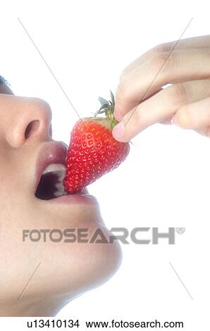 Woman, Brown Hair, Beauty, Eating, Fruit, Strawberry, Mouth View Large Photo Image Picture - Woman, Brown Hair, Beauty, Eating, Fruit, Strawberry, Mouth. Fotosearch