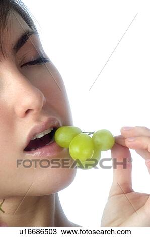 Woman, Brown Hair, Beauty, Eating, Fruit, Grapes, Mouth View Large Photo Image Stock Image - Woman, Brown Hair, Beauty, Eating, Fruit, Grapes, Mouth. Fotosearch