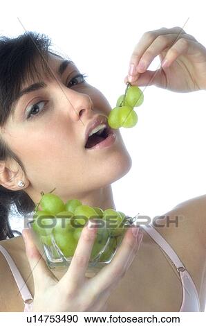 Woman, Brown Hair, Beauty, White undershit, Eating, Fruit, Grapes View Large Photo Image Stock Image - Woman, Brown Hair, Beauty, White undershit, Eating, Fruit, Grapes. Fotosearch