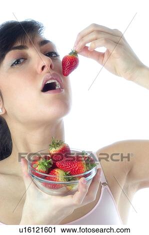 Woman, Brown Hair, Beauty, White undershit, Eating, Fruit, Strawberry View Large Photo Image Stock Image - Woman, Brown Hair, Beauty, White undershit, Eating, Fruit, Strawberry. Fotosearch
