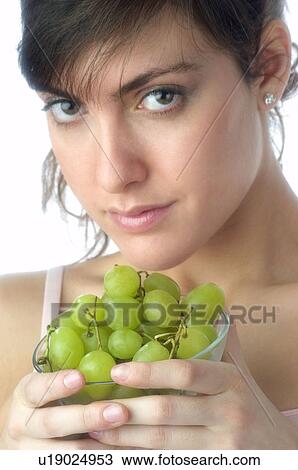 Woman, Brown Hair, Beauty, White undershit, Eating, Fruit, Grapes View Large Photo Image Stock Image - Woman, Brown Hair, Beauty, White undershit, Eating, Fruit, Grapes. Fotosearch