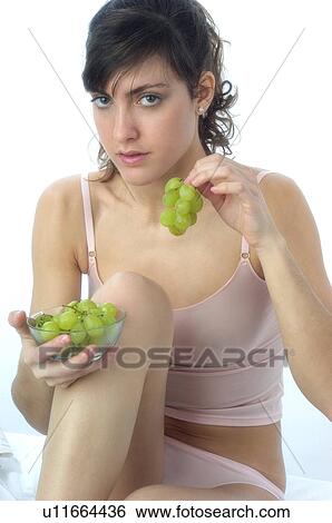 Woman, Brown Hair, Beauty, White undershit, Eating, Fruit, Grapes View Large Photo Image Stock Photograph - Woman, Brown Hair, Beauty, White undershit, Eating, Fruit, Grapes. Fotosearch