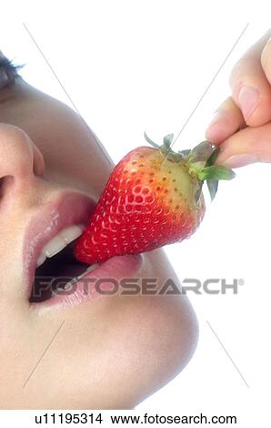 Woman, Brown Hair, Ponytail, Beauty, White undershit, Eating, Fruit View Large Photo Image Picture - Woman, Brown Hair, Ponytail, Beauty, White undershit, Eating, Fruit. Fotosearch