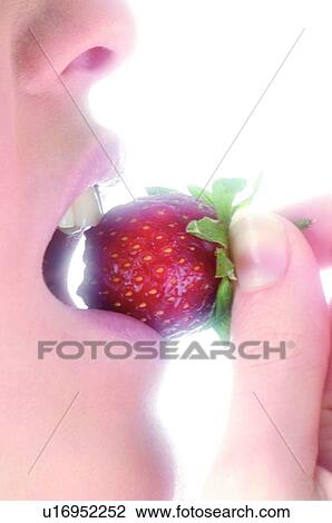 Stock Image - Woman, Beauty, Eating, Fruit, Strawberry, Mouth, Opening mouth. Fotosearch