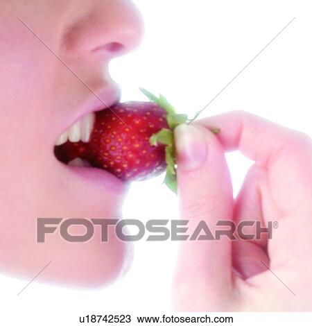 Stock Image - Woman, Beauty, Eating, Fruit, Strawberry, Mouth, Opening mouth. Fotosearch