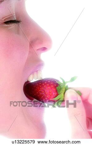 Stock Photo - Woman, Beauty, Eating, Fruit, Strawberry, Mouth, Opening mouth. Fotosearch