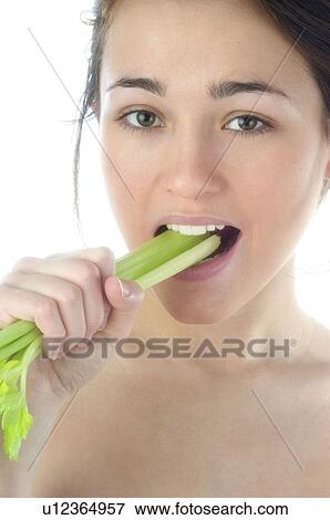 Woman, Beauty, Eating, Vegetable, Leek, Mouth, Opening mouth View Large Photo Image Stock Photo - Woman, Beauty, Eating, Vegetable, Leek, Mouth, Opening mouth. Fotosearch