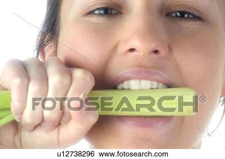 Woman, Beauty, Eating, Vegetable, Leek, Mouth, Opening mouth View Large Photo Image Stock Photograph - Woman, Beauty, Eating, Vegetable, Leek, Mouth, Opening mouth. Fotosearch