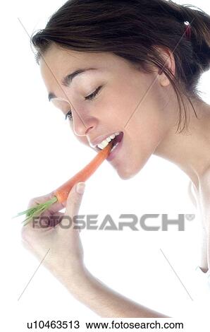 Woman, Beauty, Eating, Vegetable, Carrot, Mouth, Opening mouth View Large Photo Image Stock Image - Woman, Beauty, Eating, Vegetable, Carrot, Mouth, Opening mouth. Fotosearch