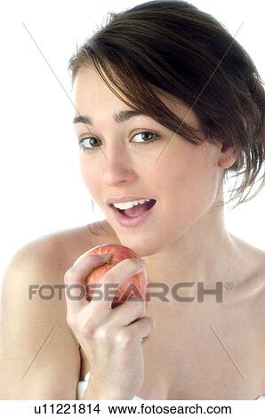 Picture - Woman, Beauty, Smiling, Fruit, Apple, Mouth, Face. Fotosearch